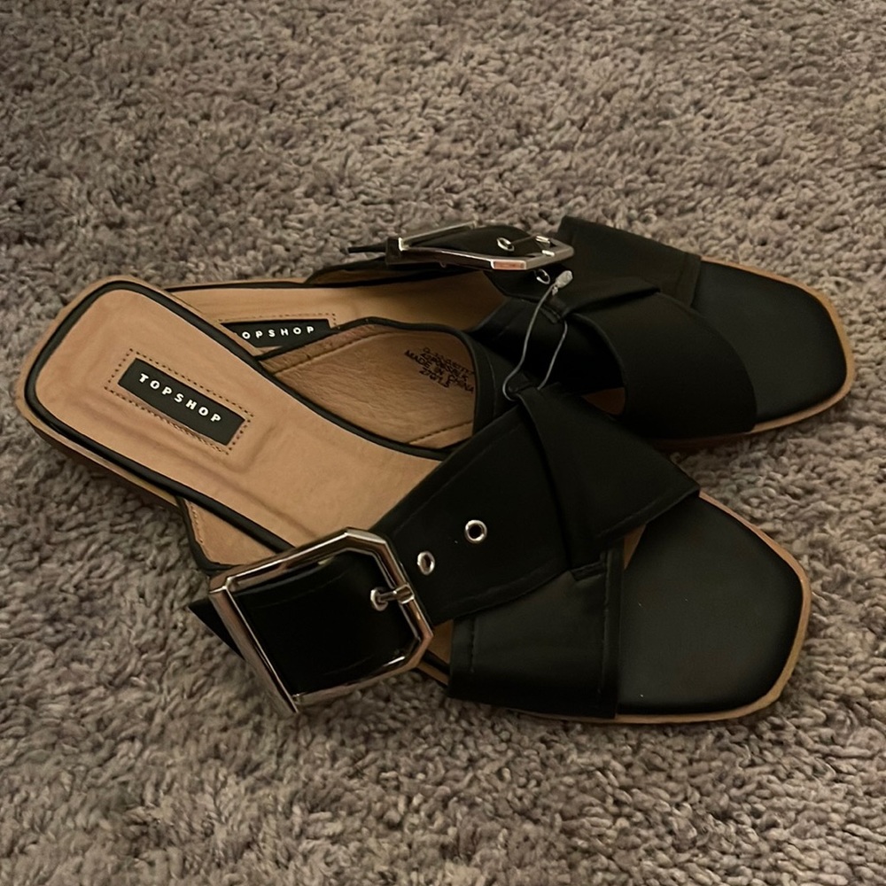 Black sandals with buckle detailing